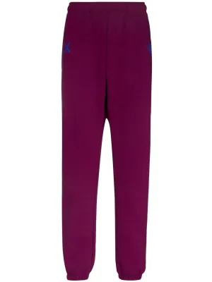 x KAWS track pants